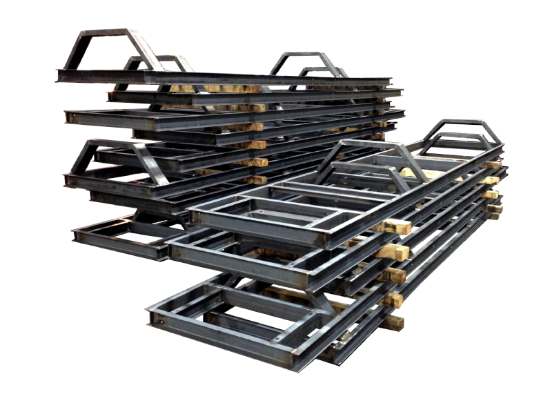 Stacked welded steel equipment frames photographed at a metal fabrication manufacturer