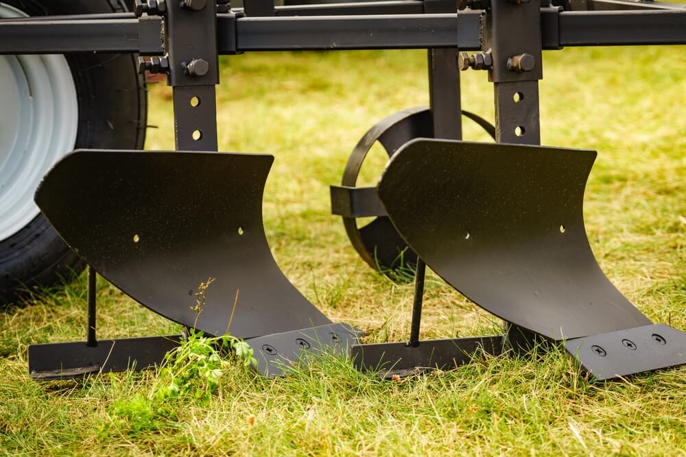 Agricultural sheet metal fabrication equipment inside a manufacturing facility
