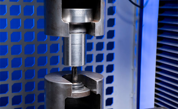Finished custom metal components prepared for final inspection and protected industrial packaging