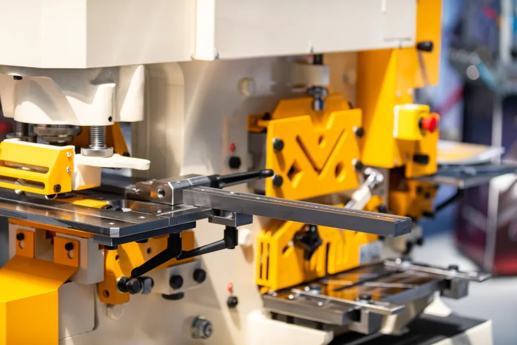 Industrial stamping press equipment used for die tryout and mass production in a metal tooling manufacturing facility