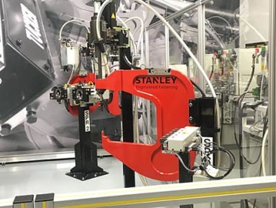 Stanley Engineered Fastening C-frame structure for assembling self-piercing rivets
