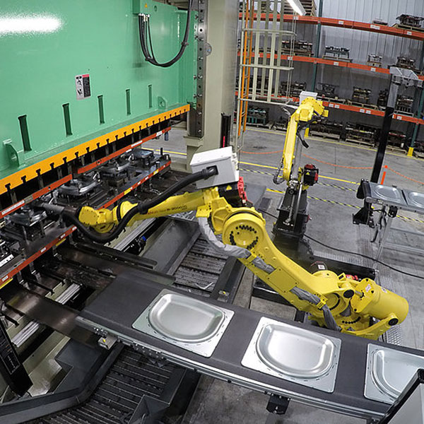 Automated stamping line producing formed metal components