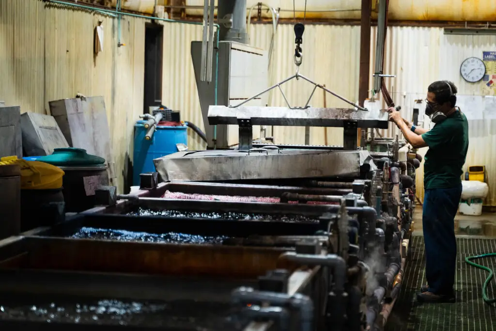Surface-finished custom metal parts prepared for project-specific quality review