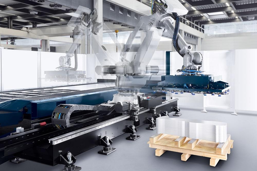 Automated laser cutting cell processing sheet metal blanks